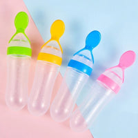 Infant Baby Squeezing Feeding Bottle With Spoon